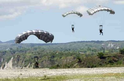 filipino special forces in low-level air drop training exercise